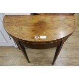 A mahogany demi-lune inlaid tea table, W.92cm