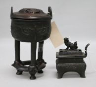 Two Chinese small bronze censers, one with carved pierced hardwood cover and stand, one