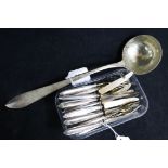 A silver 800 standard soup ladle (Austrian import mark) and ten pairs of silver-handled (800)