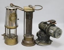Two miners lamps and a bicycle lamp