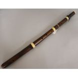 An early 19th Century sycamore and ivory flute, stamped Proser, incomplete