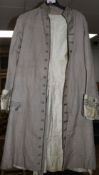 A gentleman's 19th century summer frock coat with gold braiding