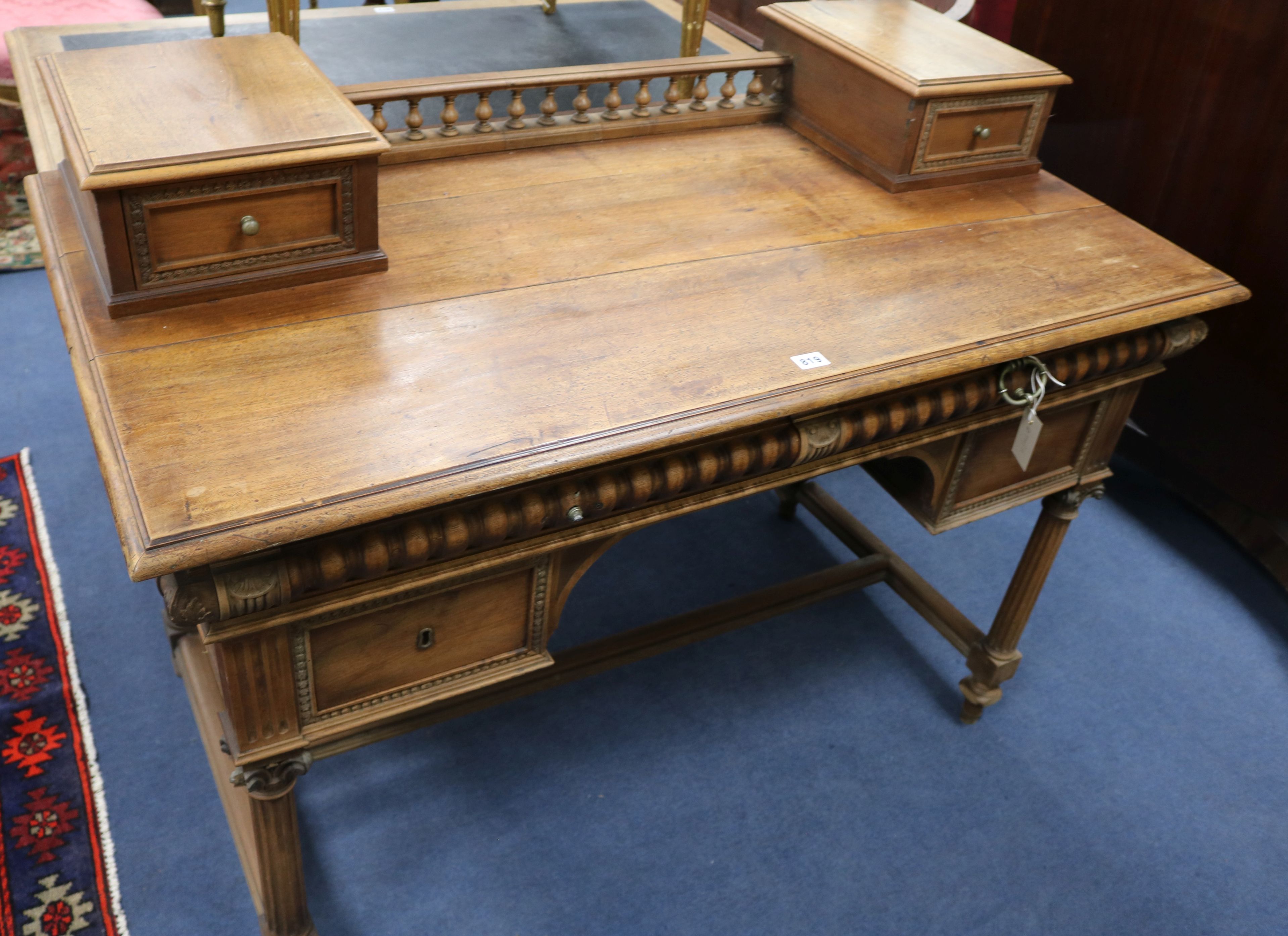 A French walnut desk, W.105cm