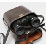A pair of Carl Zeiss Dialyt 10X4OB binoculars, brown leather case
