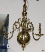 A Dutch style brass three branch chandelier