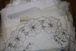 A collection of white worked table linens etc.