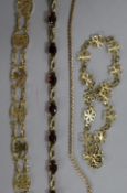 Three 9ct gold bracelets and a Chinese 14ct gold bracelet.