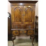 An early 18th century style walnut cabinet on stand, H.173cm