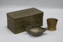 A brass Indian box, a cup and a lamp