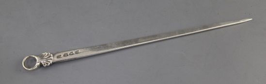 An early George III silver meat skewer by Thomas Dene, with shell terminal, London, 1766, 35.5cm,