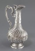 An early 20th century French silver mounted glass claret jug, possibly Baccarat, with wrythened