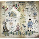 A 17th century English silkwork panel, depicting a lady, gentleman and child, with a peacock,