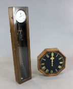 An oak cased Synchronome electric wall clock, with slave dial, clock 4ft 2in.