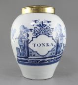 A Dutch delft blue and white tobacco jar, late 18th century, the ovoid body painted with two Indians