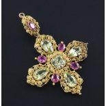 A late Victorian gold, ruby and green chrysoberyl set cross pendant, with cannetile work setting and