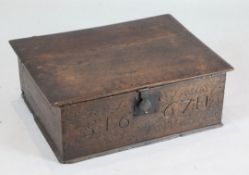 A 17th century oak bible box, the front initialled and dated 1667, with internal candle box, W.2ft