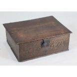 A 17th century oak bible box, the front initialled and dated 1667, with internal candle box, W.2ft