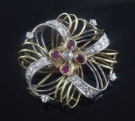 A 1980's 18ct gold, ruby and diamond set open cagework brooch, makers mark, C & F, 1.75in.