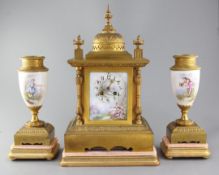 A 19th century French ormolu and porcelain clock garniture, comprising architectural clock and