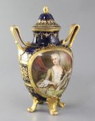 A Vienna style twin handled vase and cover, c.1910, painted with a portrait of an aristocratic