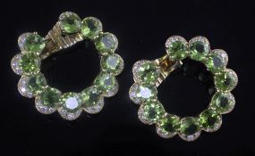 A pair of 18ct gold, peridot and diamond large hoop ear clips, the peridots with a total weight of