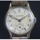 A gentleman's 1930's/1940's steel and gilt Jaeger Le Coultre manual wind wrist watch, with Arabic