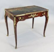 An Edwards and Roberts ormolu mounted mahogany writing table, with single frieze drawer, on cabriole