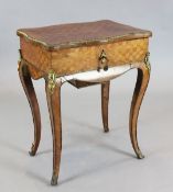 A 19th century French ormolu mounted kingwood work table, with internal mirror and frieze drawer,