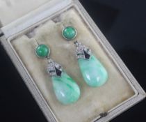 A pair of 1930's Art Deco jade, black onyx and diamond set pear shaped drop earrings, (one