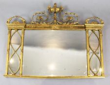 An Adam Revival giltwood and gesso overmantel, with urn crest and bevelled plates, W.4ft 1in. H.