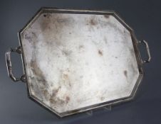 A 1930's silver two handled octagonal tea tray by Mappin & Webb, with fluted border, Sheffield,