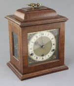 A 1930's walnut chiming bracket clock, copying a model by Thomas Tompion, height 11.5in.