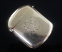 A George V 9ct gold vesta case, with engraved crest and monogram, 5cm, gross 23 grams