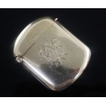 A George V 9ct gold vesta case, with engraved crest and monogram, 5cm, gross 23 grams