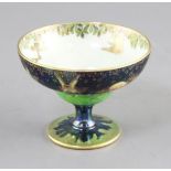 A Wedgwood Fairyland lustre 'Leap Frogging Elves' pedestal bowl, designed by Daisy Makeig-Jones, the