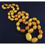 A single strand graduated oval amber bead necklace, gross weight 136 grams, 108cm.