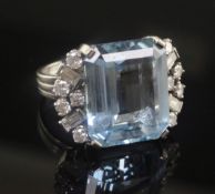 An Art Deco style white metal, aquamarine and diamond set dress ring, size L.
