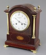 An Edwardian Mappin & Webb brass mounted mahogany mantel clock, with enamelled Roman dial and S.