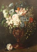 16th century Continental Schooloil on canvasStill life of flowers in an ornate vase, a wasp