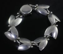 A 1950's Danish Georg Jensen sterling silver tulip bracelet, design no. 93, 7in.