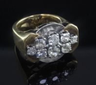 A stylish continental gold and diamond cluster cocktail ring, set with round and old cut diamonds,