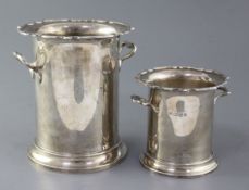 Two graduated George V two handled silver syphon stands by Barker Brothers, Chester, 1925, 18cm et