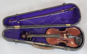 A half size violin with one piece back, bearing label 'Compagnon', overall 19.5in., cased with bow