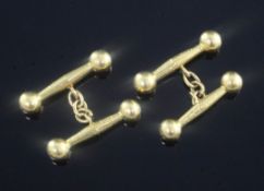 A pair of Chinese gold dumbbell cufflinks, gross 5.7 grams.