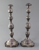 A pair of 1930's silver Sabbath day candlesticks by Moshe Rubin, with turned and engraved stems,