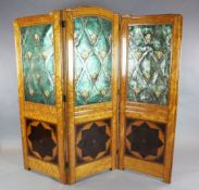 A Jugendstil satinwood, embossed leather and inlaid three-fold dressing screen, inset with