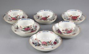 A set of six Chinese famille rose and underglaze blue teabowls and saucers, Qianlong period, each