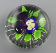 A Baccarat 'pansy' glass paperweight, 19th century, with star cut base, diameter 6cm