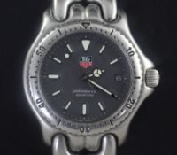 A gentleman's stainless steel Tag Heuer Precision 200 Meters quartz wrist watch, black dial, with