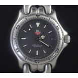 A gentleman's stainless steel Tag Heuer Precision 200 Meters quartz wrist watch, black dial, with